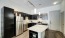kitchen with island stainless steel appliances