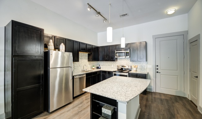 kitchen with island stainless steel appliances
